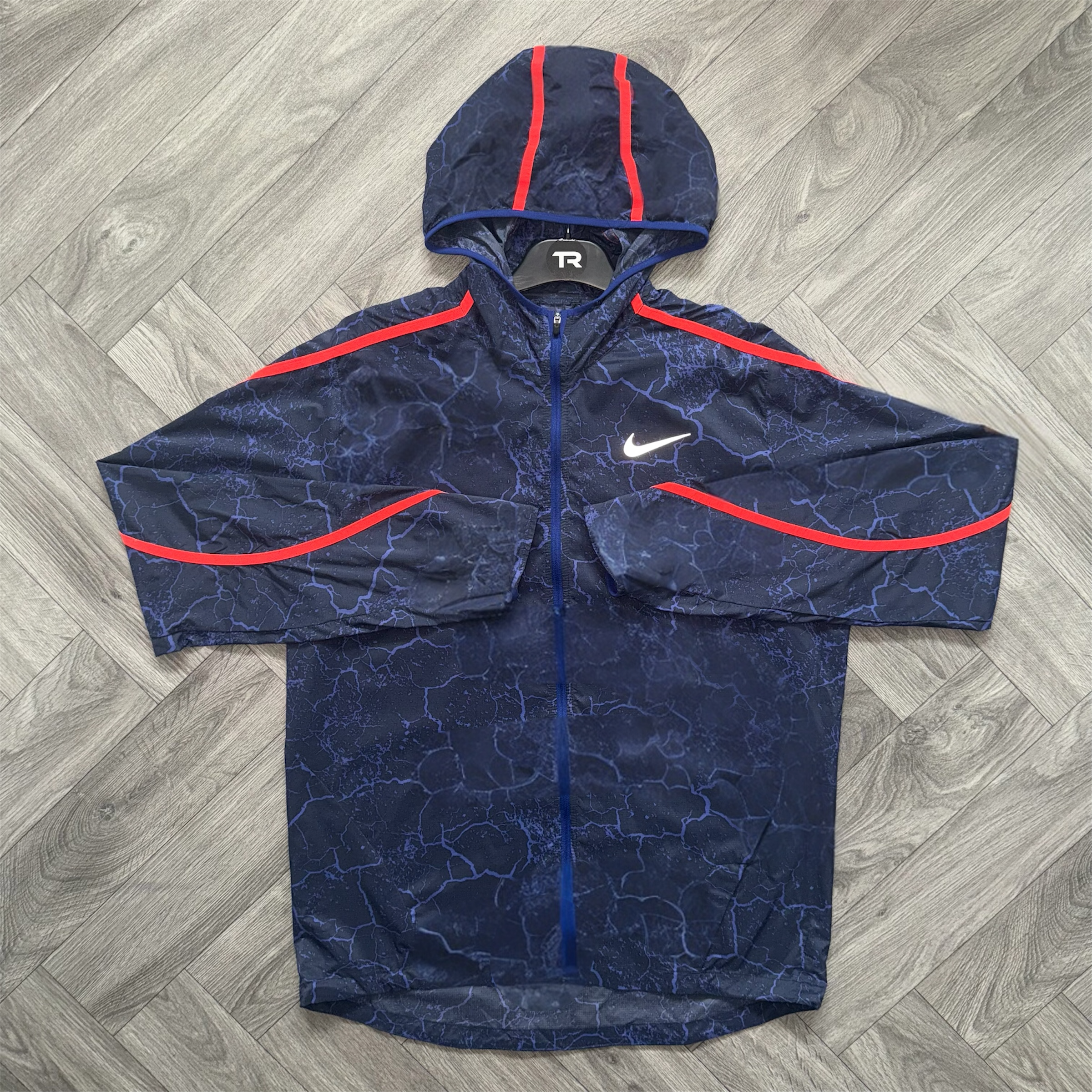 Impossibly Light Blue Nike Lightning Jacket