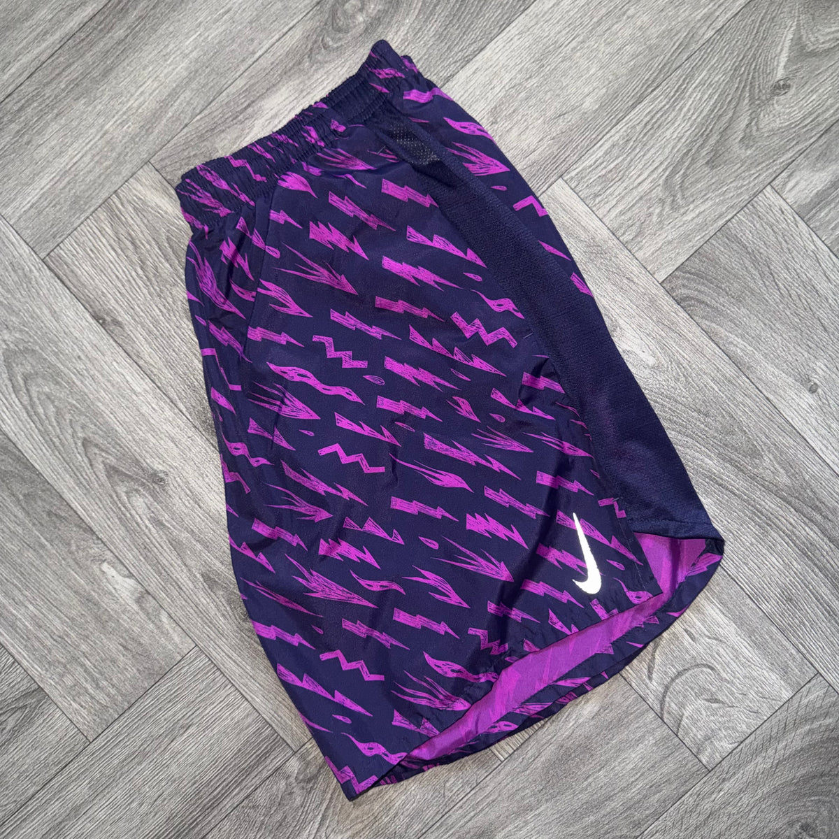 Purple Nike Bolt Shorts